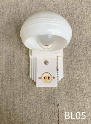 BL05-Qty-4. White porcelain base with white glass vintage bathroom sconce, with plug outlet, pull chain and medium base socket. 7 ½”H x 5”W. Vintage