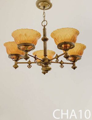 CHA10-Qty-1.  Brass vintage chandelier with 5 amber glass shades. Candelabra light bulbs.
