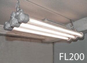 FL200-Qty-4. Grey industrial explosion proof vintage fluorescent 4ft 3 lamp T12 c/w 2 ballasts and cord. The centre lamp can be swithched off. Led package available.