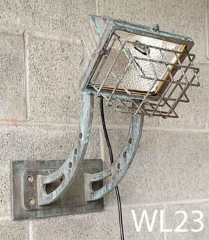 WL23-Qty-1. Aged 500 watt halogen c/w wall bracket and cord.