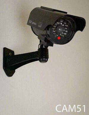 CAM51-Qty-7.  Black camera with adjustable wall mount bracket and red flashing light battery operated 2- AA batteries