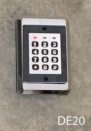 DE20-Qty-1. Black and silver pushbutton 4 ½”H x 2 ¾”W  c/w red light and numbers light up 12 volt DC