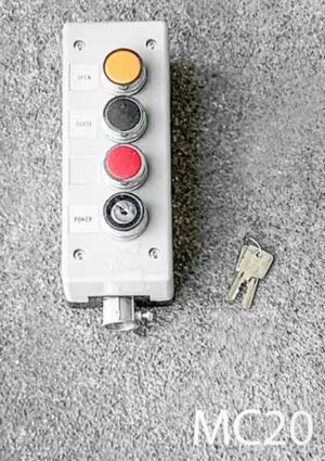 MC20-Qty-1. Grey push button box with 3 buttons and key switch with key. 7" x 3".