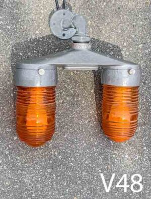 V48-Qty-2. Metal base with 2 amber glass lights and 2 cords. 13" W x 13" H