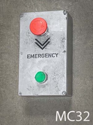 MC32-Qty-1. Grey box with green light and red emergency switch. 4.5" x 7.5"