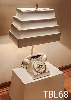 TBL68-Qty-1 Ivory vintage table lamp with telephone and clock face, with metal tiered shade. 16"H x 11"W