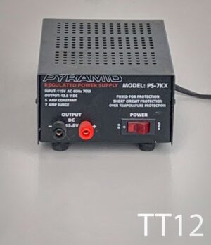 TT12-Qty-1. Black power supply with wire outlets,red light on/off switch and cord. 5"W x 3.5"H x 7.5" deep.