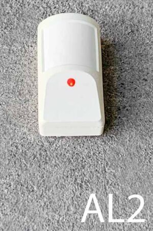 AL2-Qty-2. Beige alarm motion detector with red flashing Led by 2 AA batteries 3.5" x 2"