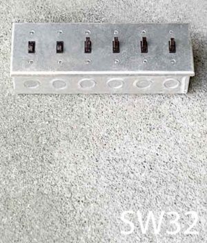 SW32-Qty-1. Aluminum box with cover and 6 brown switches.