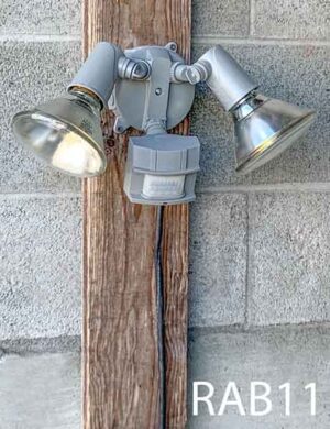 RAB11-Qty-5. Grey adjustable double head with motion sensor, box and cord.