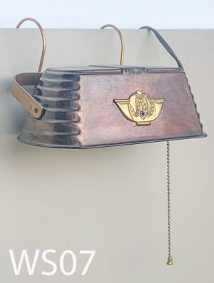 WS07-Qty-1. Copper bed reading light with brass emblem, pull chain, and cord.