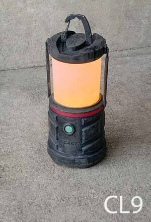 CL9-Qty-1. Black rubber lantern uses batteries.