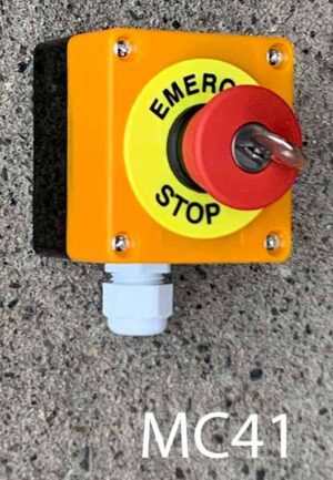 MC41- Qty-1. Orange and black emergency stop with red button and key. 3" x 3"