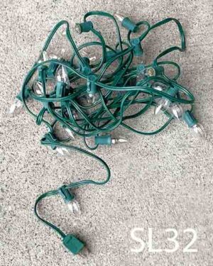SL32-Qty-7. Green 25' candelabra string with socket every 12". 6 pieces have clear 7 watt bulb.